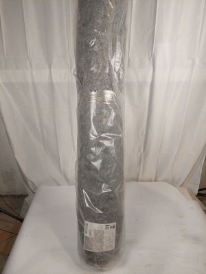 une photo d'un rouleau de tissu posé sur une table