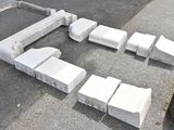 a lot of concrete blocks laid out on the ground