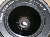a close up of a camera lens on a table
