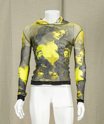 a mannequin wearing a yellow and black hoodie