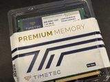 a memory card in a plastic container on a table