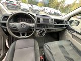 a dashboard of a car with many cars in the background