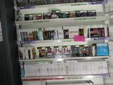 a lot of video games on the shelves in the store