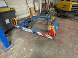 a picture of a car being worked on in a garage