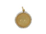 a close up of a gold coin with a diamond border around it