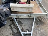 an image of a small trailer with a grill on it