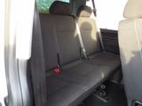 two seats in the back of a truck with a seat belt
