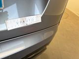 a sticker that says vauto on the back of a car