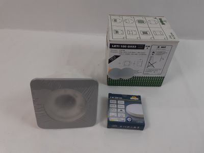 a box with a remote control next to a box with a remote control