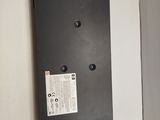 a close up of a metal plate mounted to a wall next to a door