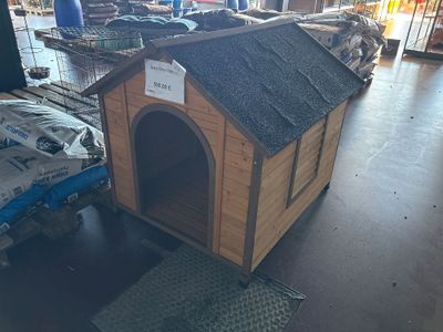 a dog house that is in the middle of the floor