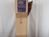 a cat that is sitting in a box on a table