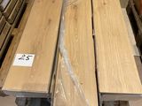two pieces of wood are stacked on a pallet in a warehouse