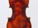 an old violin with a wooden back and a long neck