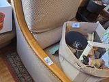 a chair with a box on it and a chair with a box in it