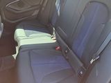 a car that has two seats in the back of it