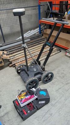 a cart that is sitting on the floor in a warehouse