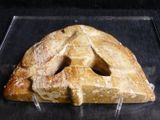a piece of bread in the shape of a face