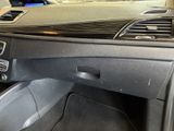 a dashboard of a car with a steering wheel in it
