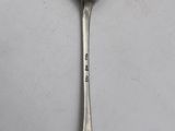a spoon that is sitting on a table
