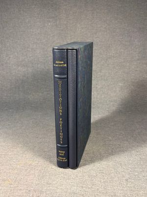 two books sitting on top of each other on a table
