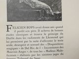 an old book with a picture of a naked woman on it
