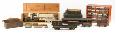many different types of toy trains and boxes on a white surface