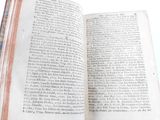 an open book that is sitting on a table