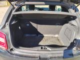a trunk of a car with the back seats folded down