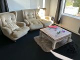 two couches and a coffee table in a living room
