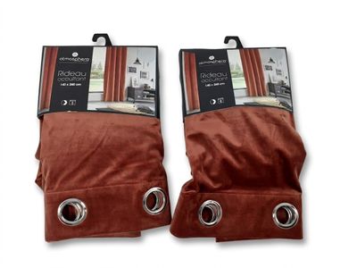 two pairs of brown velvet gloves with metal rings on them
