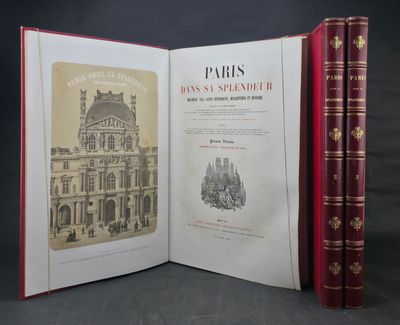 an open book with a picture of a building in the background