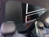 a picture of a view of a car ' s dashboard from the driver ' s seat