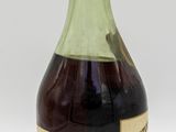 a bottle of liquor that is sitting on a table