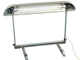 an image of a desk lamp with a roll of paper on it
