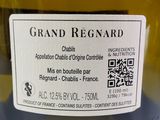 a label on a bottle of wine on a table