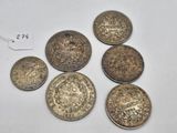 six silver coins from the british empire