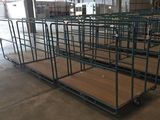many carts that are lined up in a warehouse