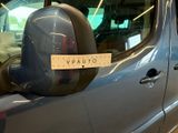 a sticker on the side mirror of a car