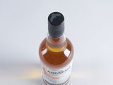 a bottle of alcohol that is sitting on a table