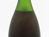 a bottle of wine that is sitting on a table