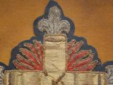 an image of a cross with a ribbon and a cross on it