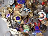 a pile of assorted metal items on a table