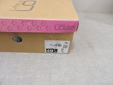 a box that has a cat inside of it on the floor