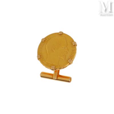 une image montrant un gros plan d'une pièce d'or posée sur un socle