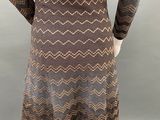 a mannequin dress with a brown and beige zigzag pattern