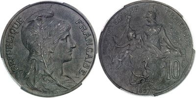 a close up of a coin with a woman on it