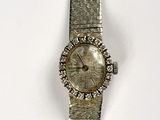 an image of a watch on a white surface