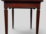 an image of a small table with a wooden top and legs