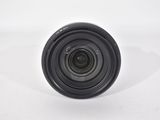 a close up of a camera lens on a white surface